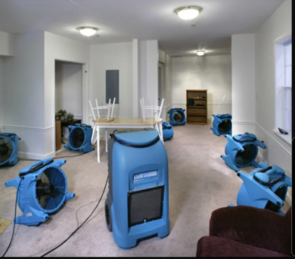 Air movers and dehumidifier setup for Water Damage Restoration in Lake City